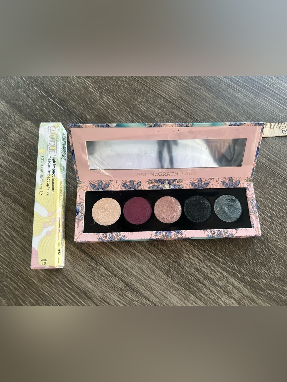 PAT McGRATH LABS Eye Shadow palette 0.14 0z and CLI NIQUE high Impact mascara.